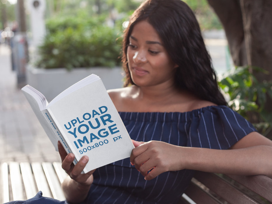 Relaxing Woman Reading a Book Mockup While Sitting on a Bench