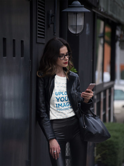Pretty Fashion Girl Calling a Cab While Wearing a Tshirt Mockup a17358