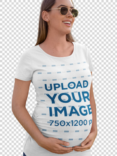 Transparent T-Shirt Mockup of a Pregnant Woman with Sunglasses Against Long Leaves