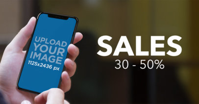 Mockup of a Man Holding an iPhone 11 Pro