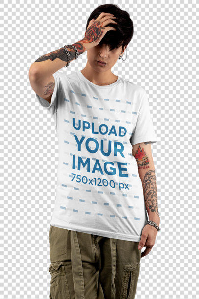 Transparent T-Shirt Mockup of an Androgynous Woman with Tattooed Arms at a Studio