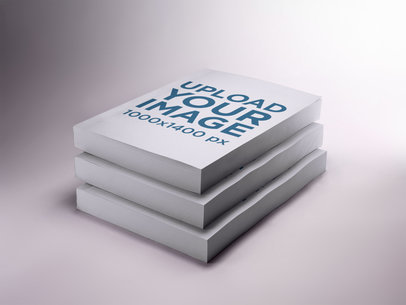 Three Books Mockup on a White Surface
