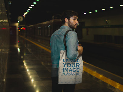 Man Carrying a Tote Bag Mockup in a Subway Station
