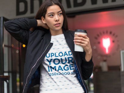Pretty Asian Woman Buying a Coffee While Wearing a T-Shirt Mockup