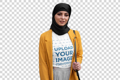 Transparent Mockup of a Woman with a Hijab Holding a Bag