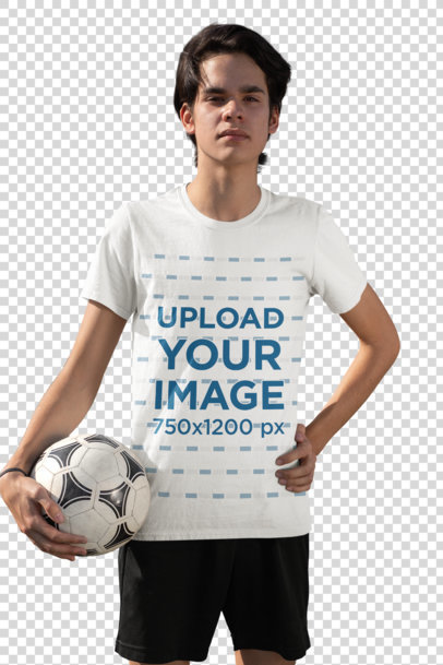 Transparent T-Shirt Mockup Featuring a Serious Teenage Boy Holding a Soccer Ball