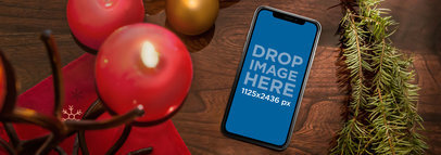 Christmas Table with an iPhone X Mockup a17548