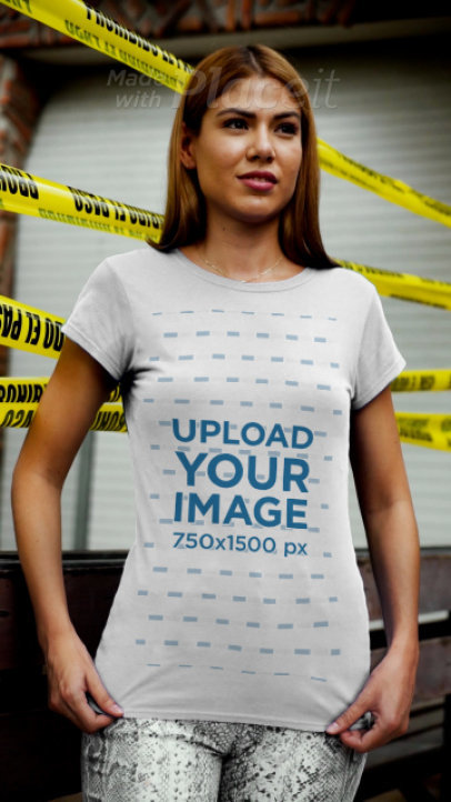 T-Shirt Video Featuring a Woman and Police Tape in the Background
