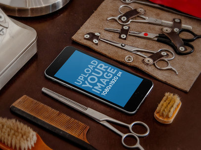 Mockup of an iPhone 6 at a Barber Shop