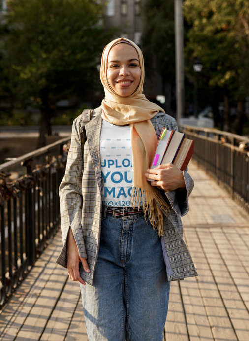 T-Shirt Mockup of a Female Student Wearing a Hijab