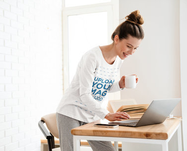 Long Sleeve Tee Mockup Featuring a Happy Woman Working From Home m13743-r-el2
