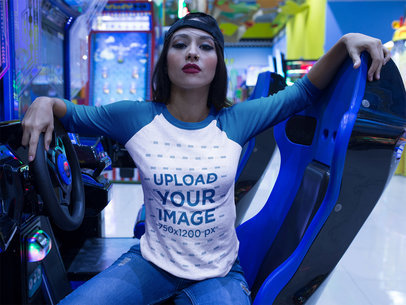 Girl with an Attitude Wearing a Raglan Tee Mockup Sitting in a Racing Simulator a17515