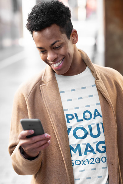 Basic T-Shirt Mockup Featuring a Man Reading a Funny Text Message