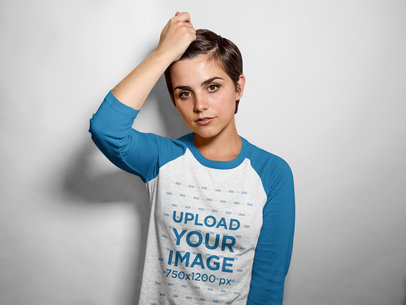Raglan Tee Mockup Featuring a Woman Grabbing Her Hair 