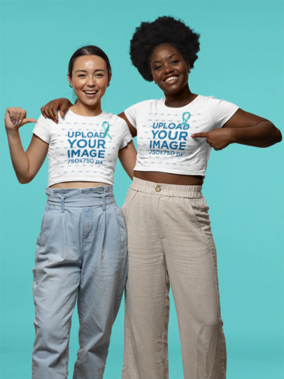 Cancer Awareness-Themed Mockup Featuring Two Happy Women Pointing at Their Crop Tops 