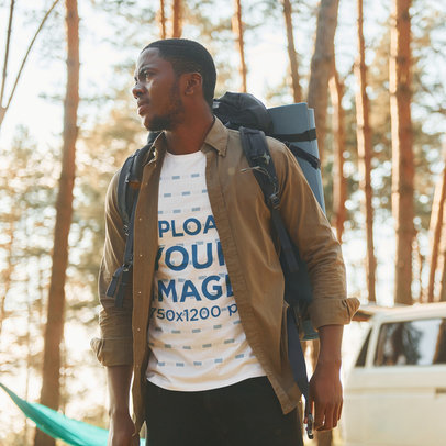 T-Shirt Mockup Featuring a Serious Man Walking in the Forest m16837 r-el2