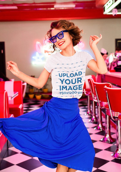 Heather T-Shirt Mockup Featuring a Happy Woman Dancing at a Retro Diner 