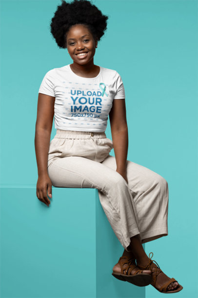 Crop Top Mockup of a Young Woman Wearing a Ribbon for Cancer Awareness