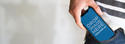 iPhone X Mockup Being Kept Away by a Guy in the Street a17627