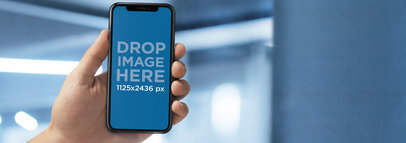 iPhone 11 Pro Mockup Being Used in an Office