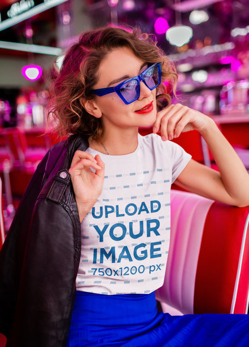 Heather T-Shirt Mockup Featuring a Happy Woman Wearing Retro Blue Sunglasses