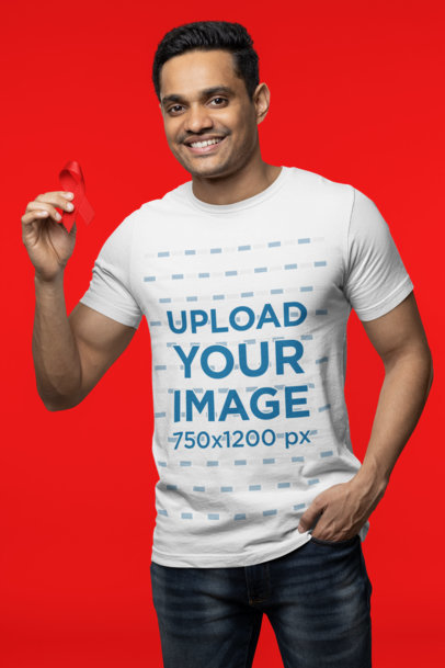 Tee Mockup of a Smiling Man Holding a Red Ribbon for World AIDS Day