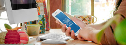 Wide Mockup of an iPhone 6 at Work