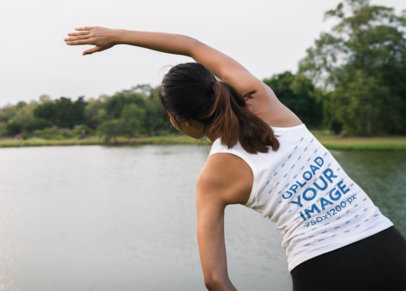 Back-View Racerback Tank Top Mockup of a Woman Exercising by a Lake