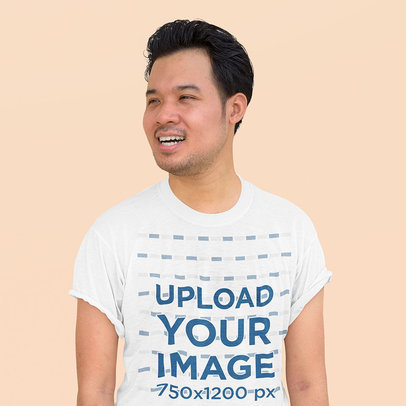 Round-Neck Tee Mockup of a Smiling Man Standing Against a Solid Surface m17693-r-el2