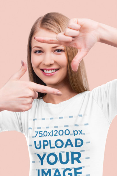 T-Shirt Mockup Featuring a Woman Framing Her Face with Her Hands