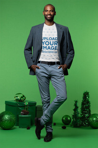 Round-Neck Tee Mockup of a Suited Man Posing by Christmas Decorations m17868