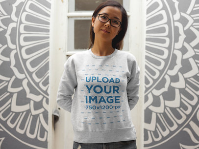Pretty Asian Girl Wearing a Crewneck Sweatshirt Template Against a Printed Wall a17608