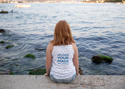Back View Tank Top Mockup Featuring a Teen Sitting by a Lake m15241-r-el2