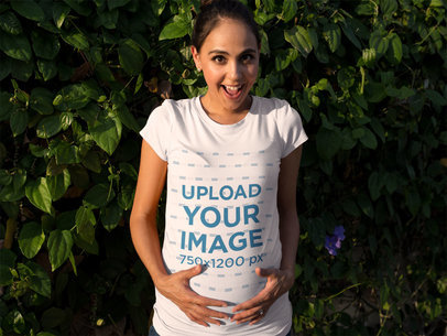Happy Pregnant Woman Wearing a T-Shirt Mockup