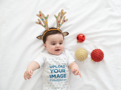 Onesie Mockup Featuring a Baby Wearing Reindeer Antlers M6222-r-el2