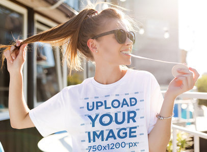 T-Shirt Mockup of a Happy Woman Enjoying the Weather m9785-r-el2