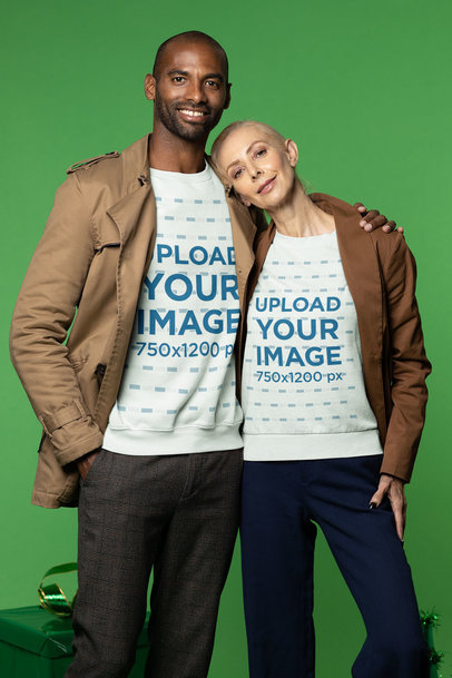 Sweatshirt Mockup Featuring a Diverse Couple in a Christmas-Themed Set