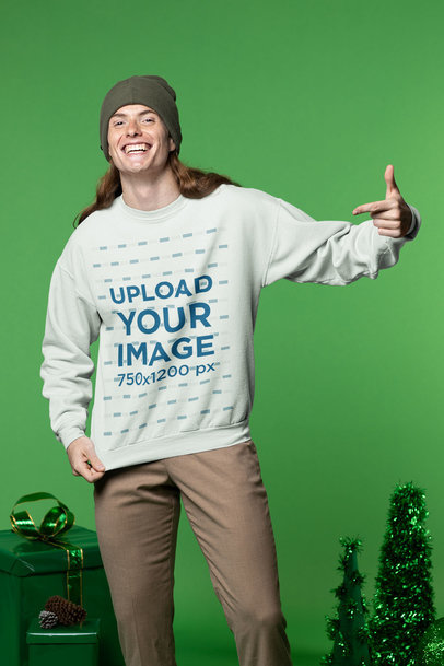 Sweatshirt Mockup of a Happy Long-Haired Man in a Christmas-Themed Setting m17926