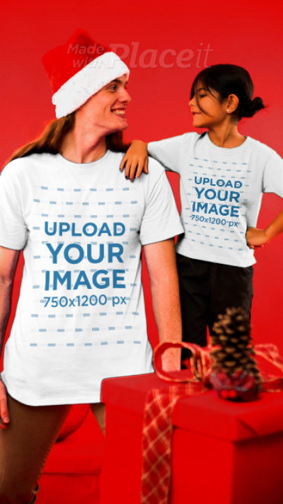 T-Shirt Video of a Man and a Little Girl in Christmas Outfits 4205v