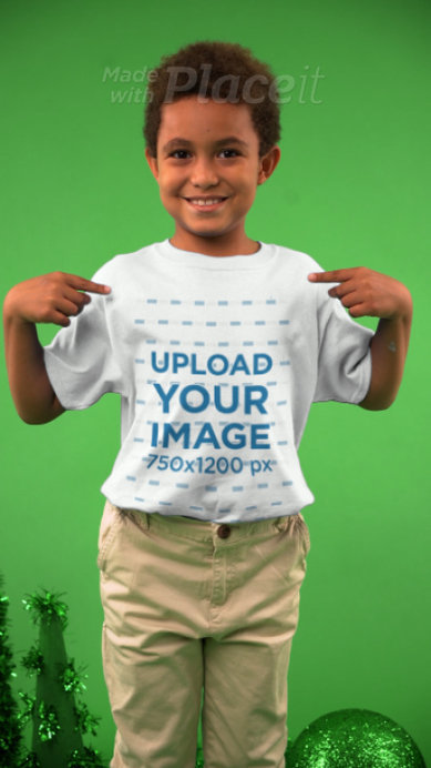 Gift Bag Video of a Happy Kid Showing His T-Shirt in a Christmas Set