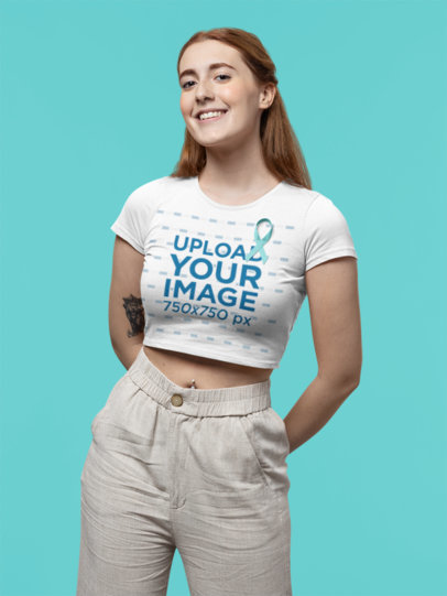 Cancer Awareness-Themed Mockup of a Young Woman Wearing a Crop Top