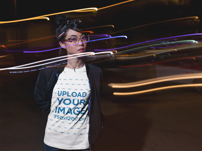 Slow Shutter Photo of a Beautiful Woman Wearing a Tshirt Mockup While at Night