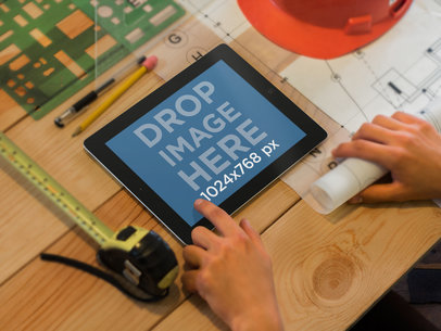 Mockup of an iPad Being Used at a Construction Site