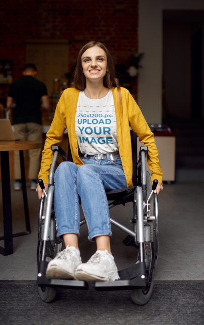 T-Shirt Mockup of a Happy Young Woman Using a Wheelchair