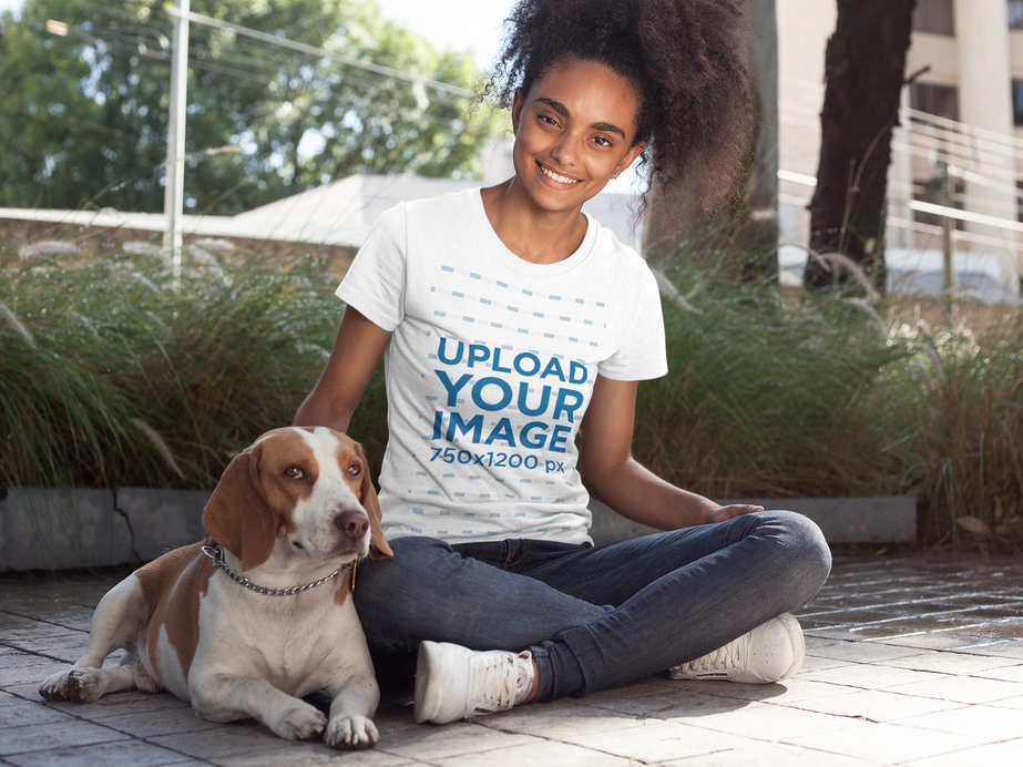 Woman Wearing a Tshirt Mockup while Petting her Dog