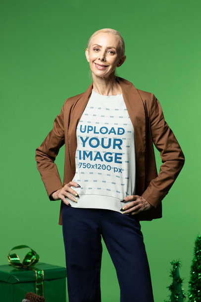  Xmas-Themed Mockup Featuring a Happy Senior Woman Wearing a Sweatshirt 