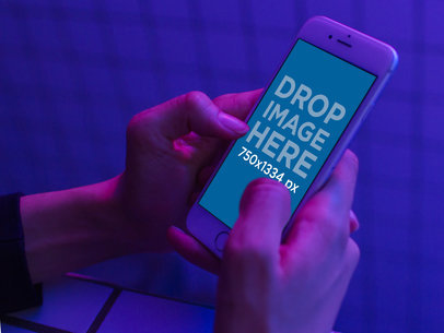 Man using iPhone Template to Play Inside a Purple Room a17774