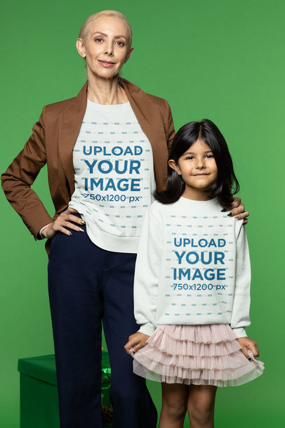 Sweatshirt Mockup of a Woman and a Little Girl in a Christmas-Decorated Setting