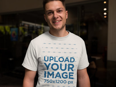 Smiling Dude Wearing a Tshirt Template While Looking to the Camera