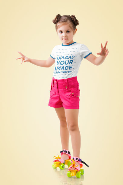 Ringer T-Shirt Mockup of a Little Girl Wearing Roller Skates in a Studio